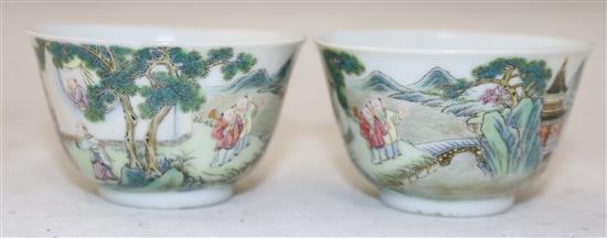 A pair of Chinese famille boys cups, Yongzheng marks, 18th/19th century, diameter 6.25cm, restored